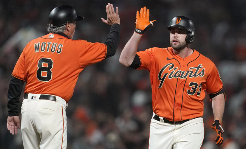 Giants clinch at least tie in NL West, match team wins mark