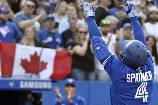 Jays stay close in wild-card race, hit 5 HRs, rout O’s 10-1