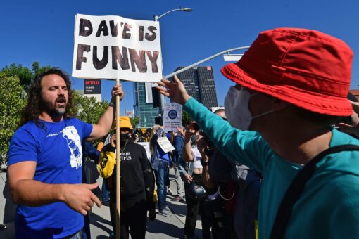 Netflix protesters furious over Chapelle special attack man with ‘We like Dave’ sign