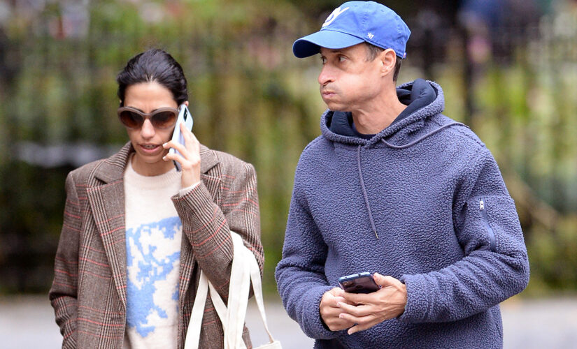 Huma Abedin and Anthony Weiner spotted together in rare photos strolling in NYC ahead of book release