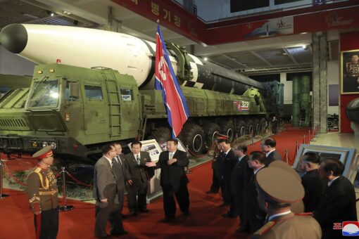 Kim vows ‘invincible’ North Korea military during rare exhibition of weapons