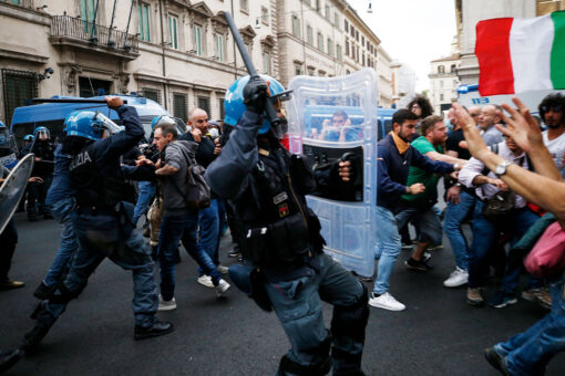 Rome protesters clash with police as thousands pack the streets in opposition to COVID vaccine rule