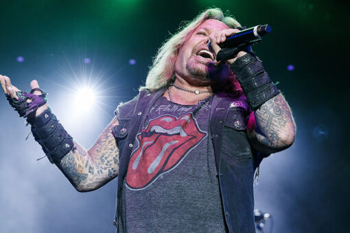 Motley Crue singer Vince Neil transported to hospital after falling off stage during concert: report