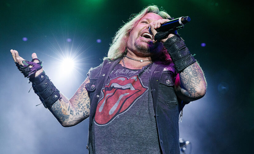 Motley Crue singer Vince Neil transported to hospital after falling off stage during concert: report