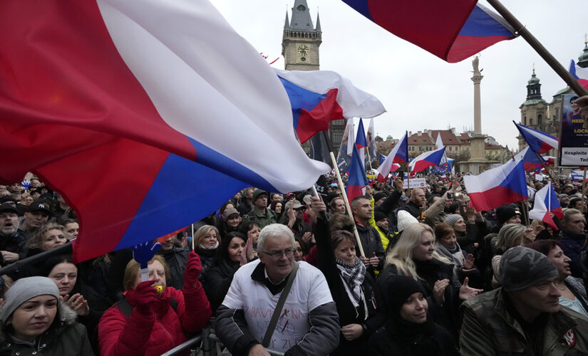 Czech protesters demand &apos;freedom&apos; as new COVID restrictions go into effect for the unvaccinated