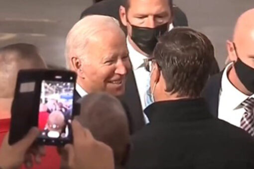 Biden shakes hands maskless but decides to put mask on before photo