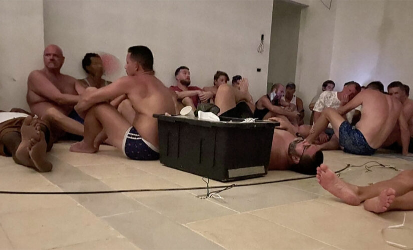 Americans at Cancun LGBT+ event in hiding after men with long guns reportedly storm beach