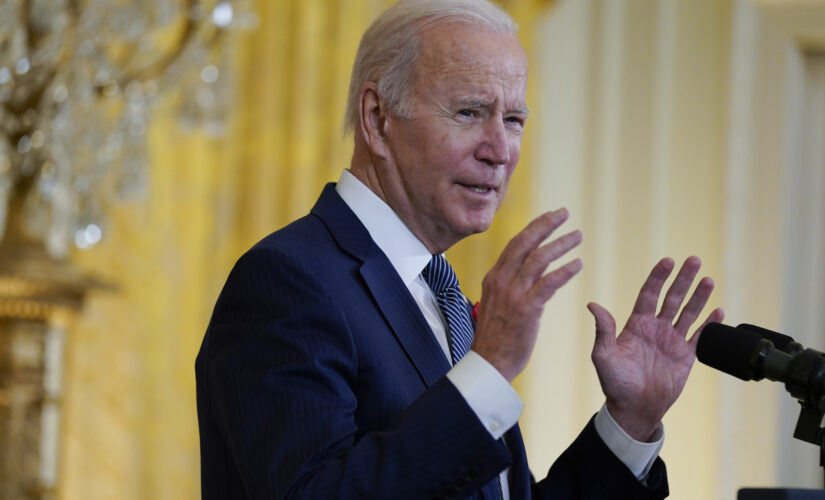 Biden on World AIDS Day declares racism a ‘public health threat’