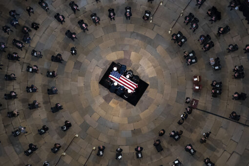 Bob Dole lies in state in Capitol Rotunda, where Biden, lawmakers pay tribute to &apos;giant of our history&apos;