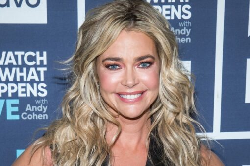 Denise Richards under fire going maskless on plane, wearing 'huge winter coat' instead