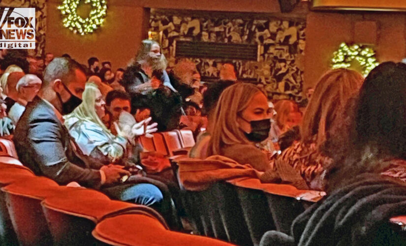Masked Chrissy Teigen and John Legend buy out entire row at NYC&apos;s vax only Radio City Music Hall
