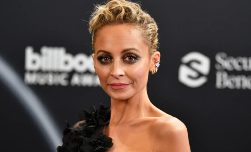 Nicole Richie stuns in golden gown for glamorous solo holiday shoot: &apos;My family forgot&apos;