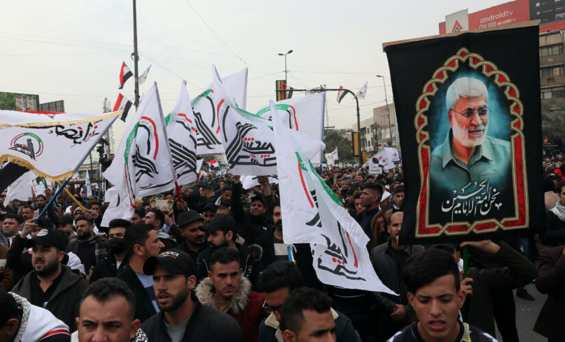 Baghdad rally marks anniversary of Iranian general&apos;s death; US, Israeli flags trampled