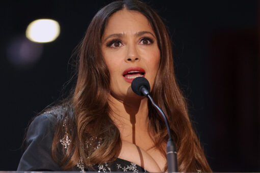 Salma Hayek enjoys ‘first coffee of the first Monday’ of 2022 as she relaxes poolside in plunging swimsuit