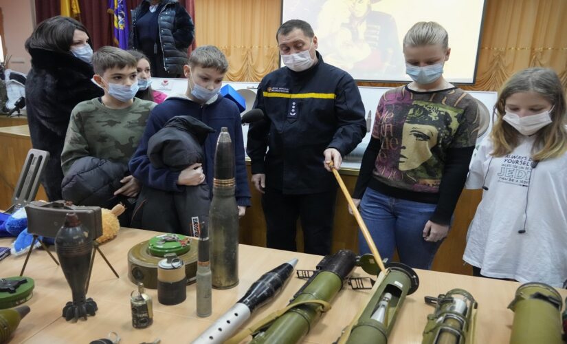 Photos show Ukrainian schoolchildren learning about explosives ahead of potential Russian invasion