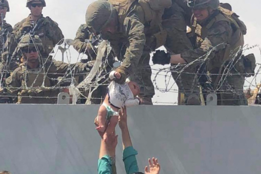Afghan baby handed to US troops during evacuation chaos returned to family