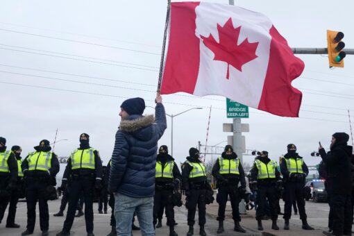 Canadian trucker protest on Ambassador Bridge ending as police follow through on emergency order