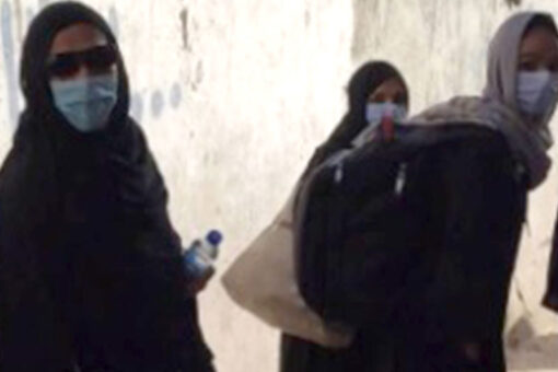 Afghan women react to Taliban allowing girls back in school as fears persist for their safety