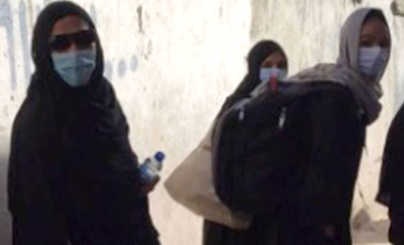 Afghan women react to Taliban allowing girls back in school as fears persist for their safety