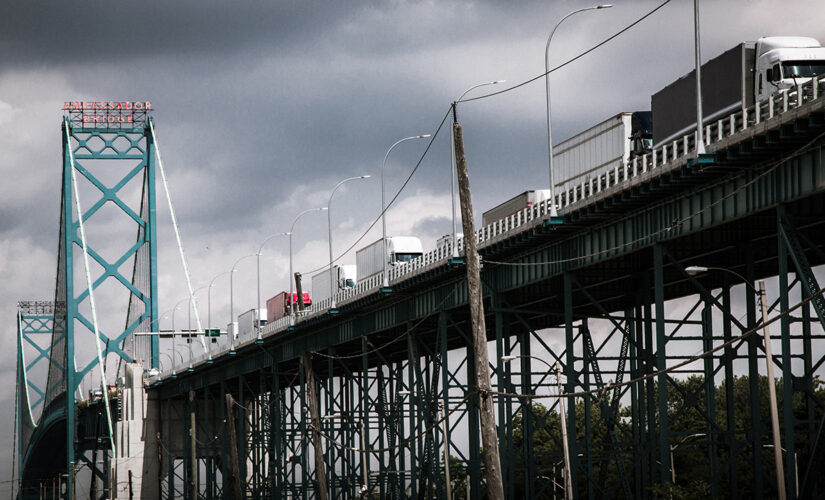 Canadian truckers shut down busiest border crossing in North America, back up Detroit roads