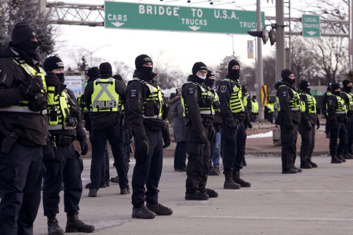 Canadian police begin arresting protesters blocking US-Canada bridge