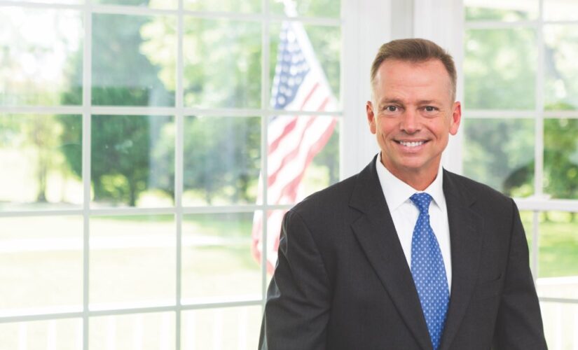 Georgia GOP candidate, a retired Marine colonel, urges military to reverse transgender policy amid Ukraine war
