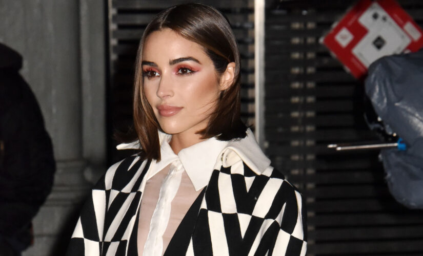 Olivia Culpo covers up with winter gear during latest airport outing, pokes fun at American Airlines incident