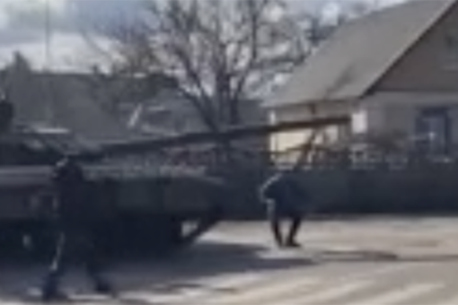 Ukrainian man squares up with Russian tank as invasion continues