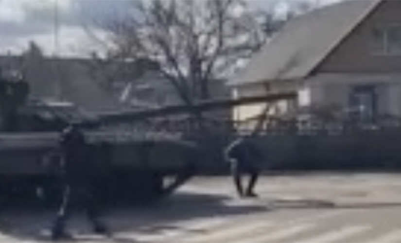 Ukrainian man squares up with Russian tank as invasion continues