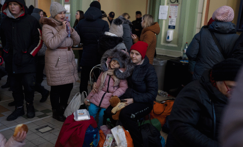 Ukraine refugees flood Warsaw, overwhelming Polish city