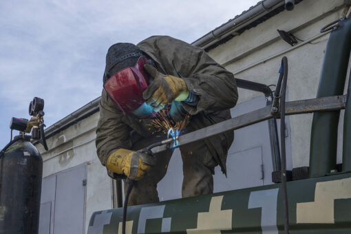 Ukrainian welders turn donated vehicles into army transport