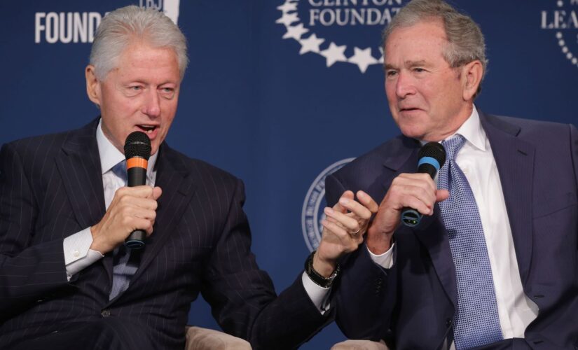 George W. Bush and Bill Clinton visit Ukrainian church to lay flowers, pay respects