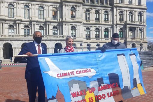 New York Democrats blasted for posing with sign comparing 9/11 to climate change
