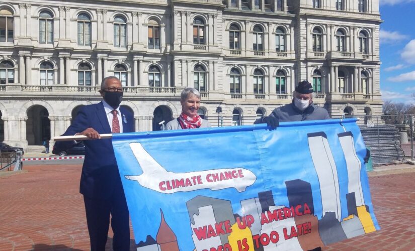 New York Democrats blasted for posing with sign comparing 9/11 to climate change