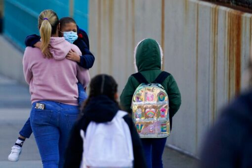 Chicago teachers vow to fight order to drop mask mandates, Puerto Rico lifts restrictions