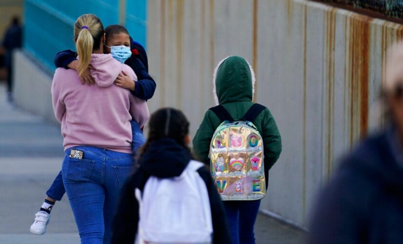 Chicago teachers vow to fight order to drop mask mandates, Puerto Rico lifts restrictions