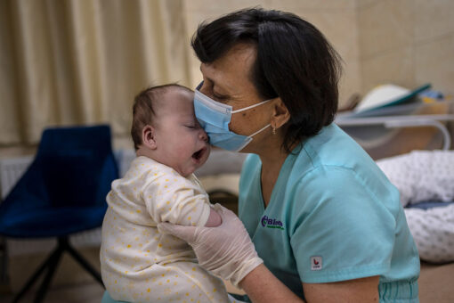 Surrogate babies born in Ukraine wait out war in basement