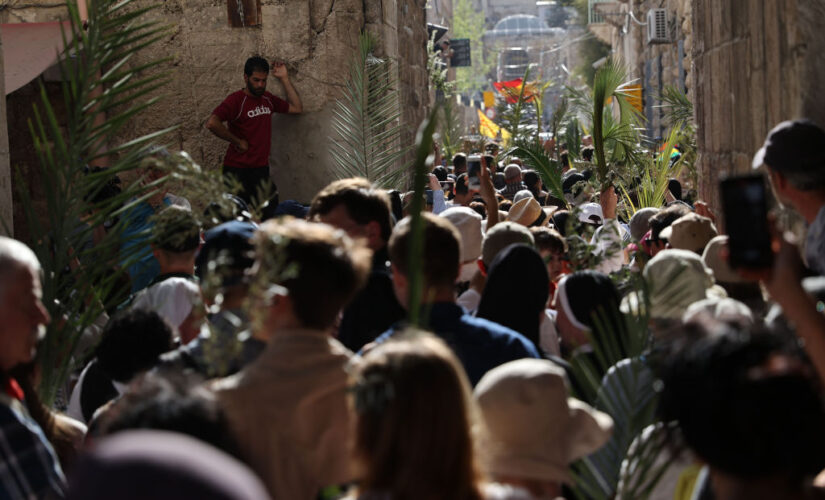 Palm Sunday sees thousands of Christians mark the triumphal entry in Jerusalem amid tensions