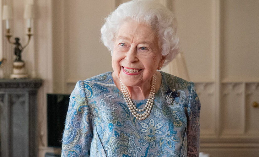 Queen Elizabeth is all smiles as she returns to work amid Prince Andrew losing ‘freedom of city’ honor