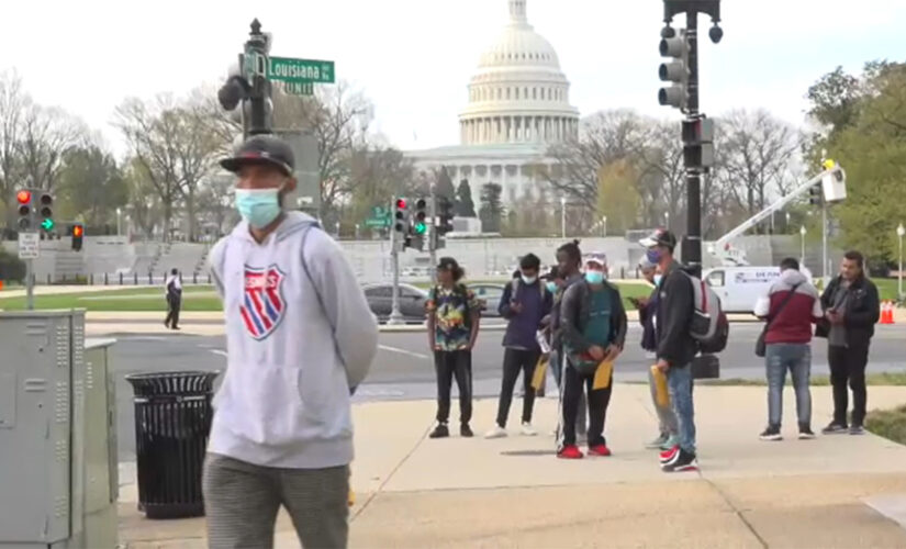 First Texas bus drops off migrants blocks from US Capitol in Washington, DC