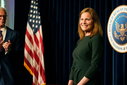 Justice Amy Coney Barrett once climbed priest’s fence in high heels to escape news cameras after church
