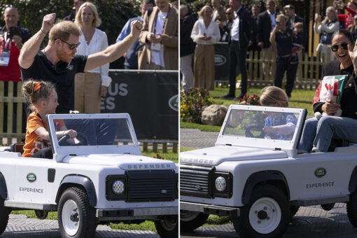 Prince Harry and Meghan Markle all smiles while riding miniature Land Rovers at Invictus Games event