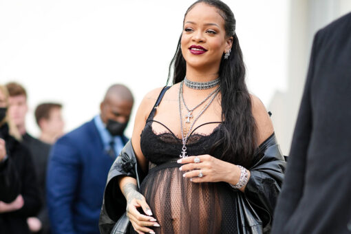 Rihanna shows off her baby bump on the cover of Vogue
