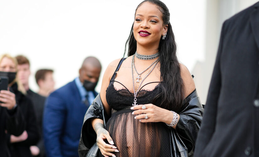 Rihanna shows off her baby bump on the cover of Vogue