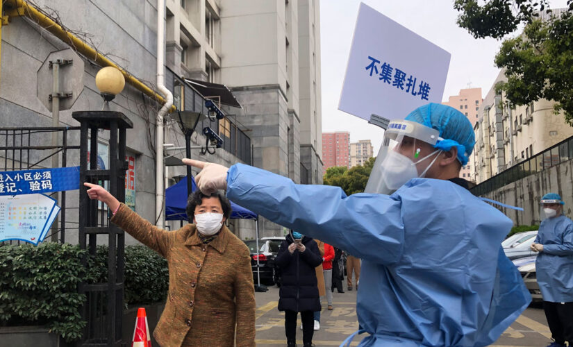 Shanghai residents recorded screaming from apartments after seven days of lockdown