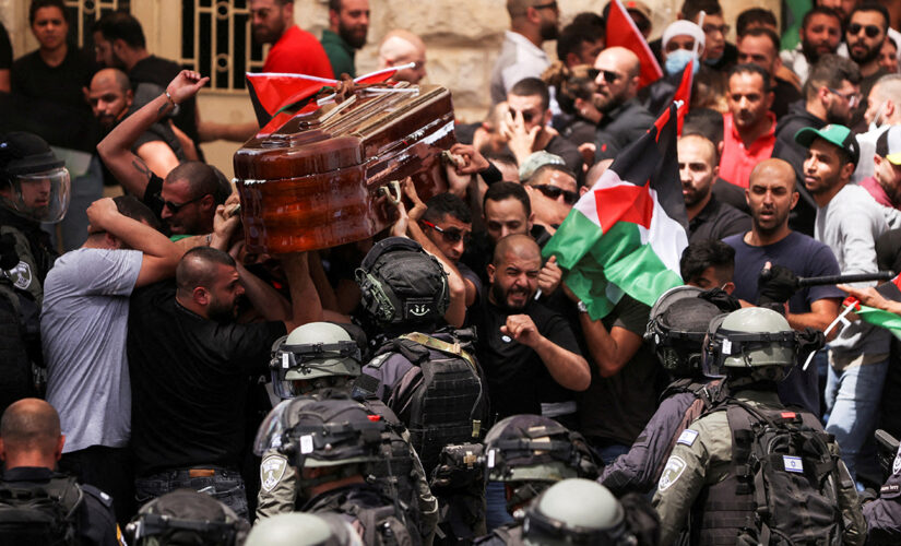 Israeli police clash with mourners carrying casket of Al Jazeera journalist Shireen Abu Akleh