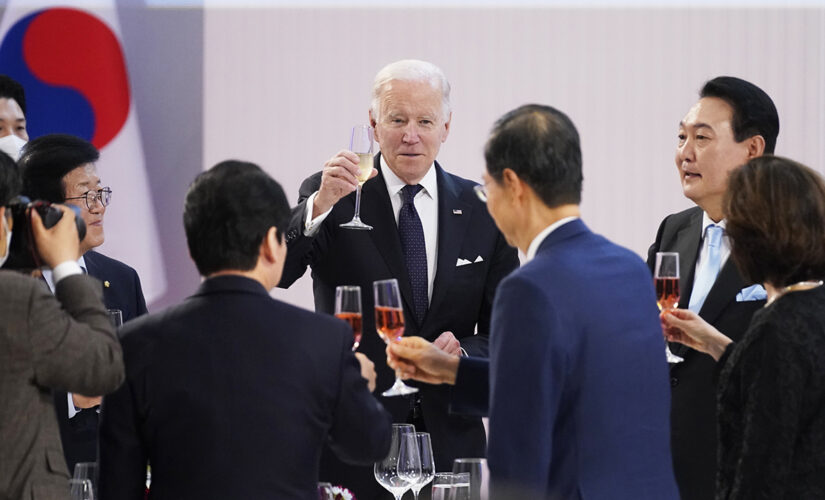 Biden signs $40B Ukraine aid bill that was flown to South Korea