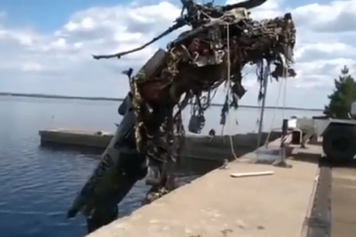 Ukraine posts video of destroyed Russian helicopter being fished out of reservoir