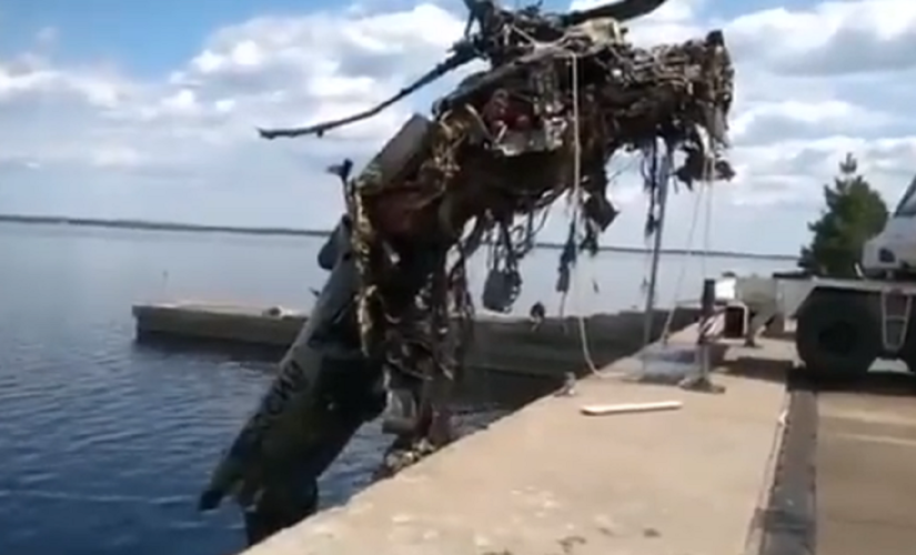 Ukraine posts video of destroyed Russian helicopter being fished out of reservoir