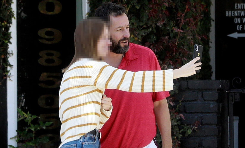 Adam Sandler snaps selfies with fan following vehicle collision in Los Angeles